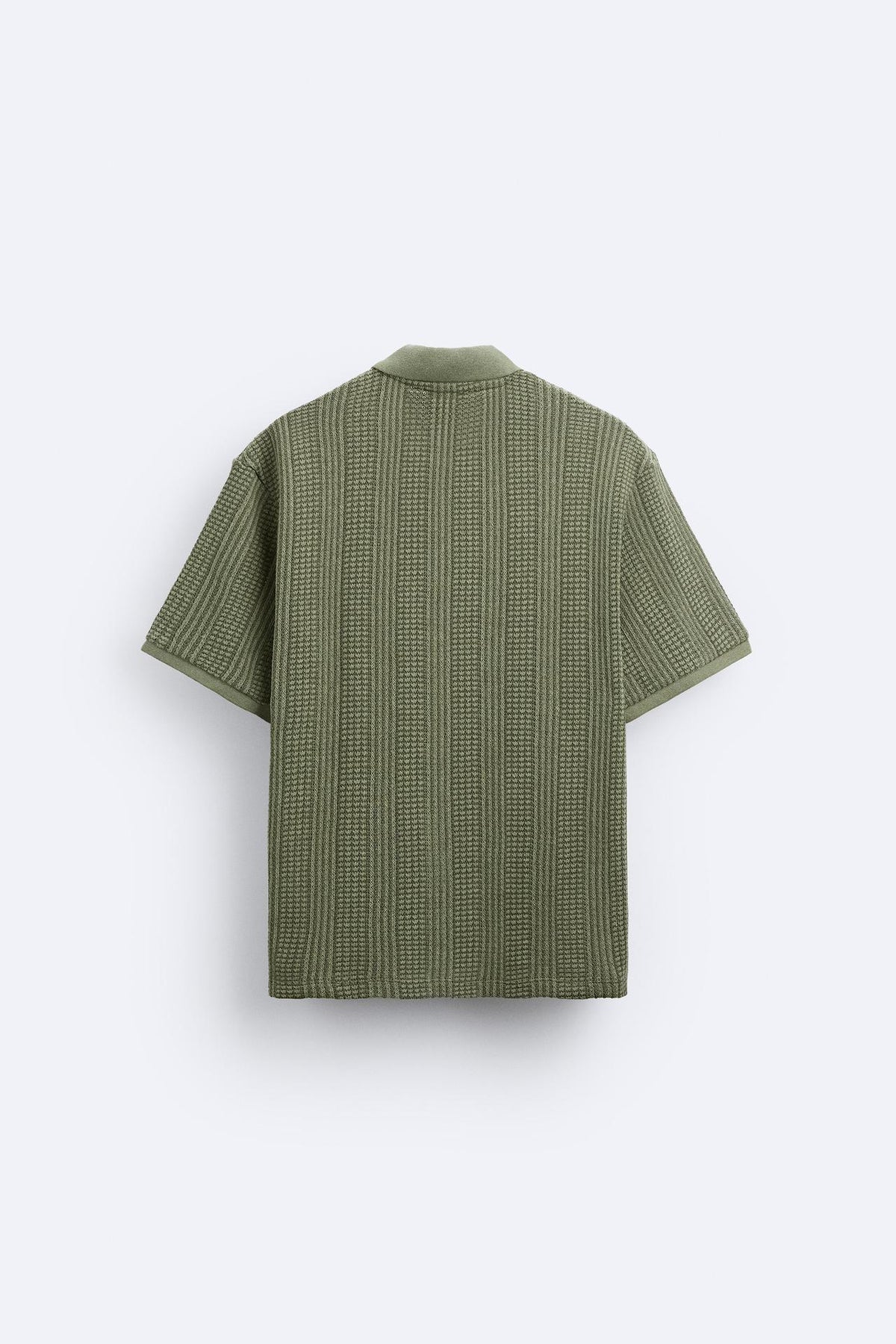 Polo structuré en tricot avec fermeture éclair
