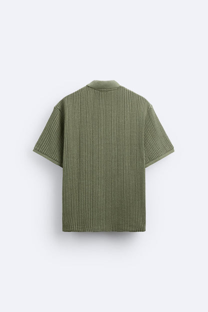 Polo structuré en tricot avec fermeture éclair