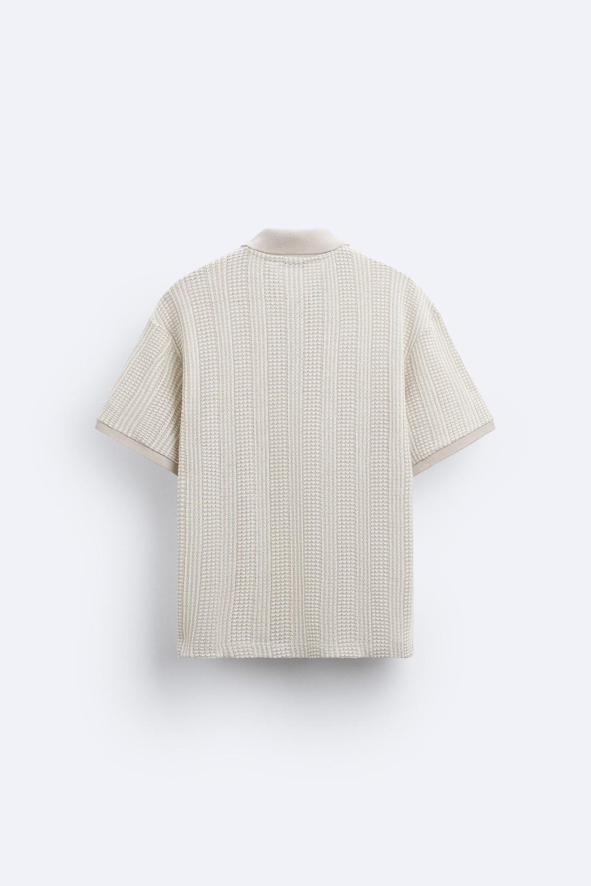 Polo structuré en tricot avec fermeture éclair