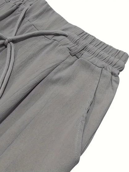 PANTALONS LARGES EN LIN AVEC CORDON