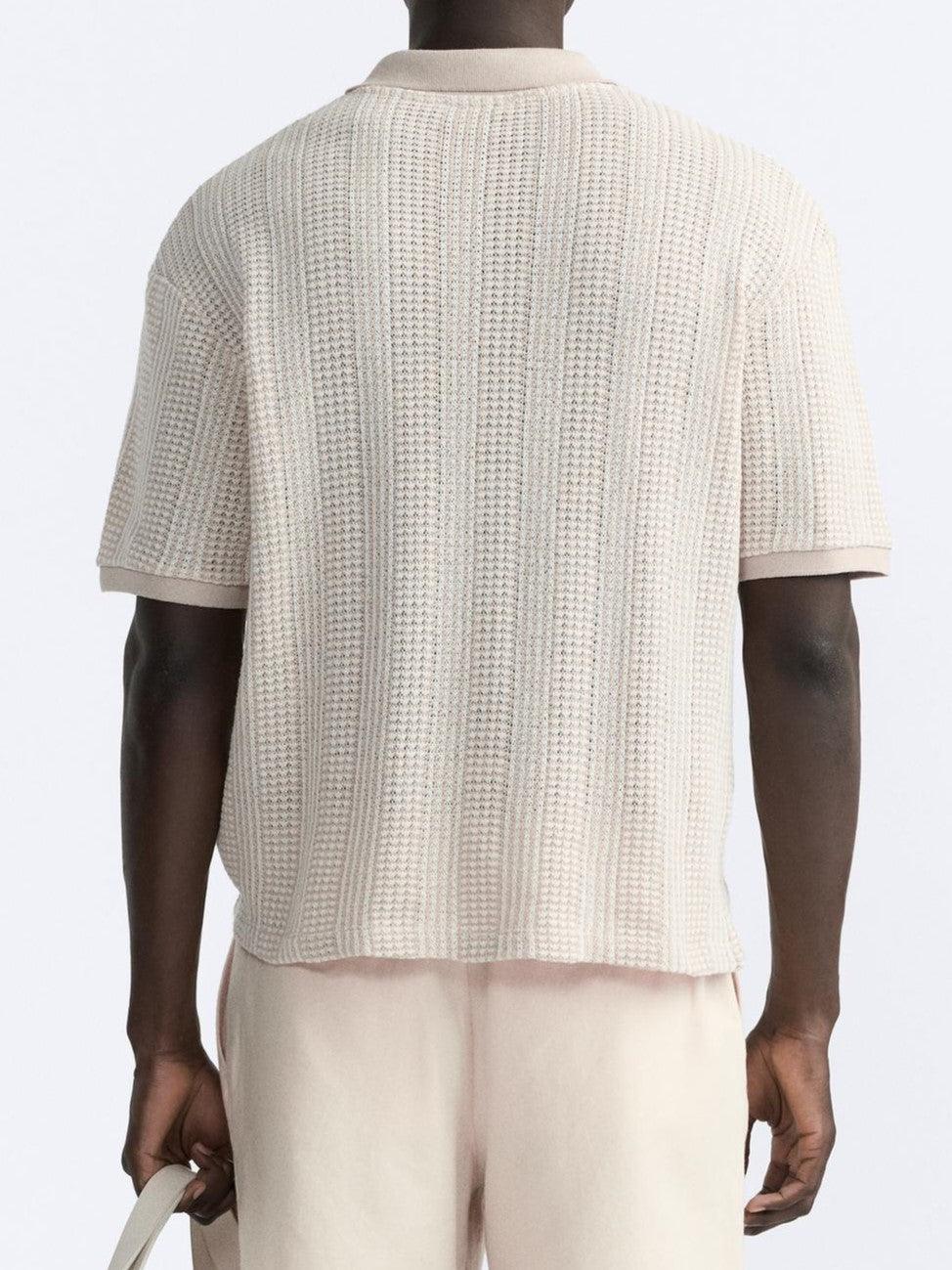 Polo structuré en tricot avec fermeture éclair