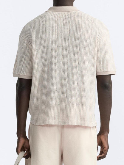 Polo structuré en tricot avec fermeture éclair